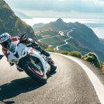 Maîtrisez les virages sinueux : les secrets d’une conduite en moto parfaite sur routes panoramiques